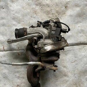 2009-2014 Volkswagen Jetta Turbocharger with Exhaust Manifold OEM 5N0-906-391-A